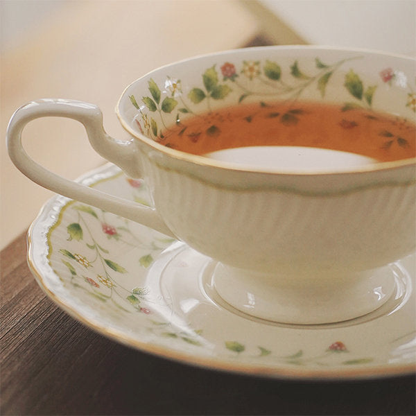 Elegant Floral Tea Cup and Saucer Set - Gold Trim Accents - Comfortable Handle