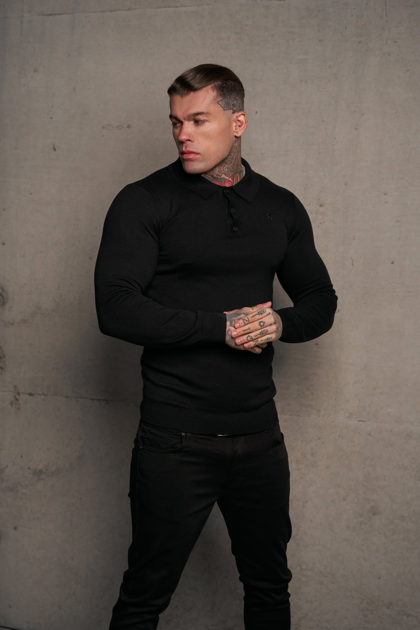 Timeless Elegance: Classic Black Long Sleeve Knitted Polo Jumper for Men with Subtle Tonal FS Embroidery - FSN139