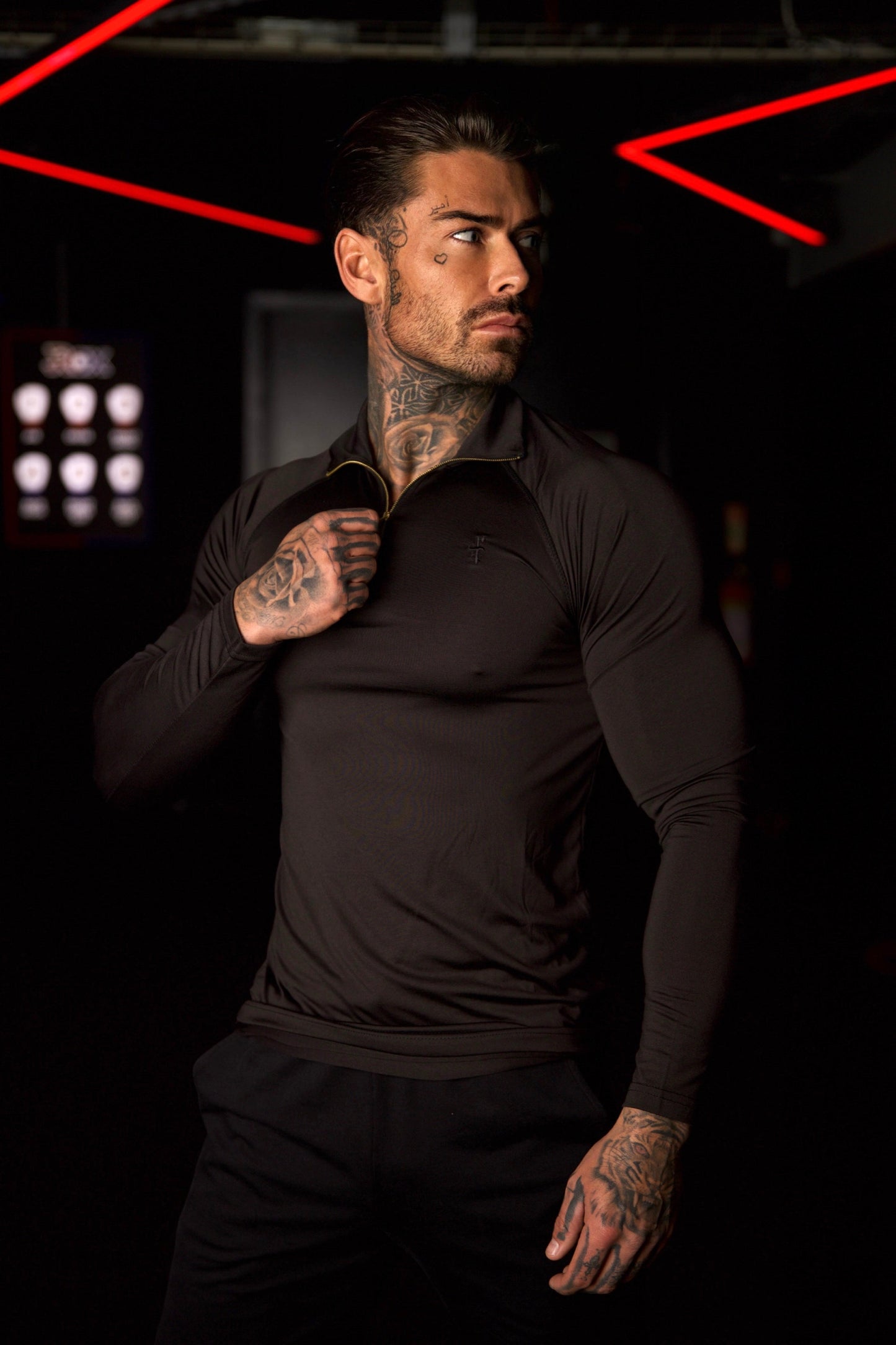 Elevate Your Workout with the Father Sons Solid Black and Gold Half Zip Long Sleeve Gym Top - FSH887