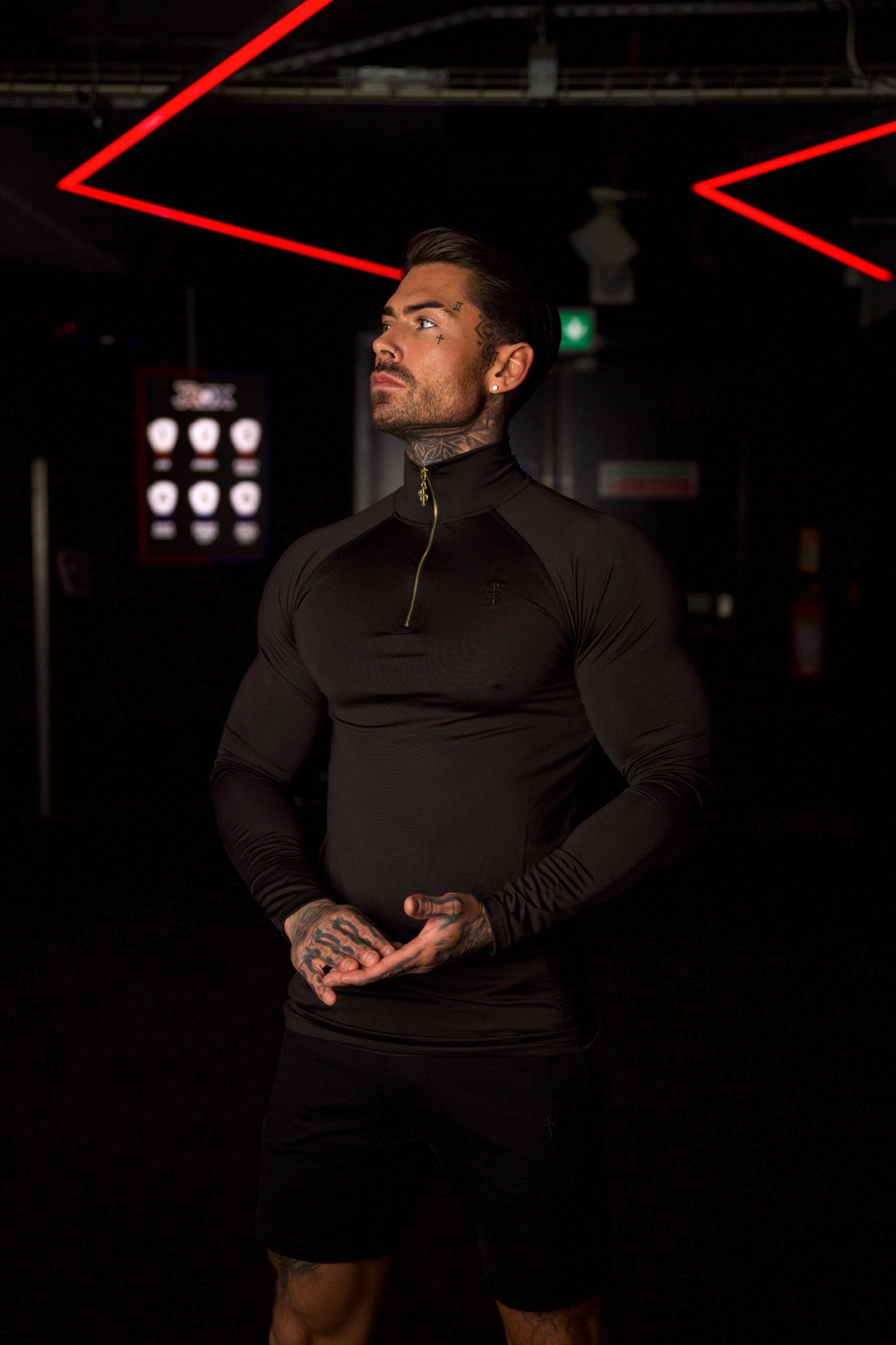 Elevate Your Workout with the Father Sons Solid Black and Gold Half Zip Long Sleeve Gym Top - FSH887