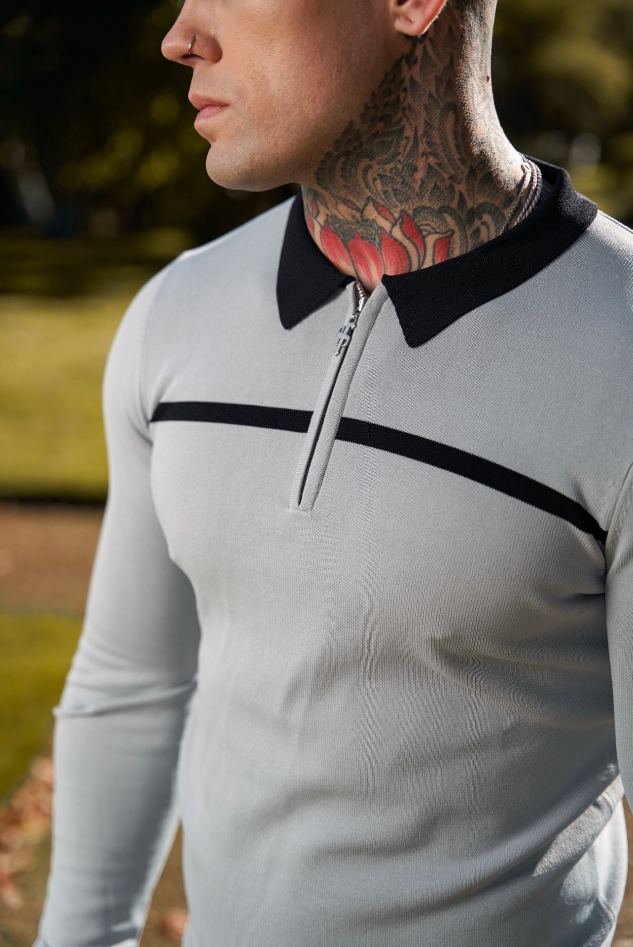 Elevate Your Style with the Father Sons Classic Silver Grey & Black Striped Zipped Polo – Perfect for Any Occasion!