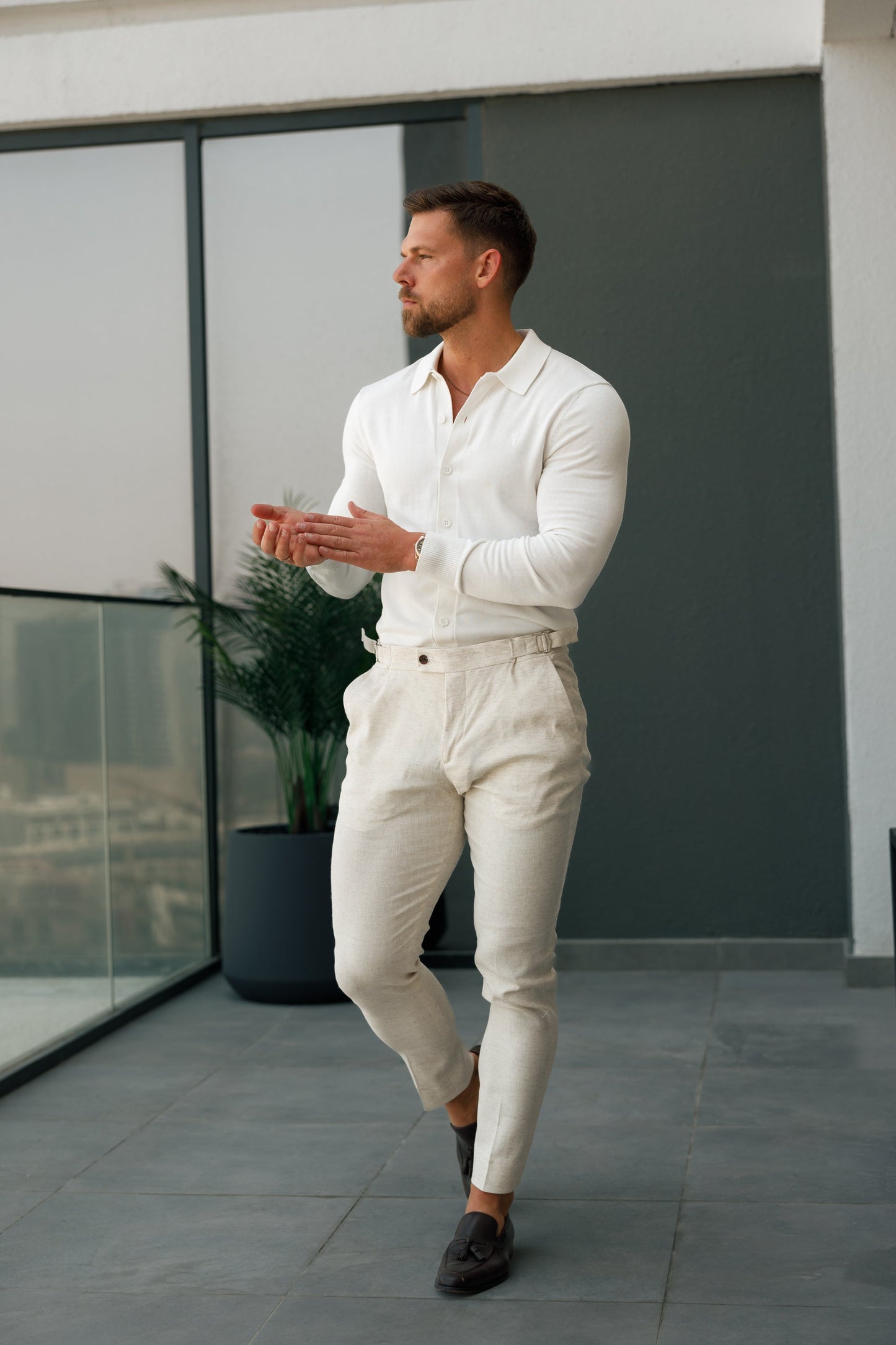 Timeless Elegance: Off White Knitted Long Sleeve Polo with Buttons by Father Sons - FSN172