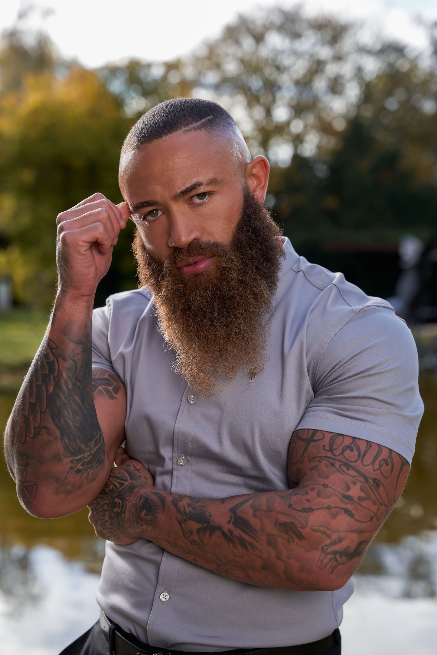 Elevate Your Wardrobe with Father Sons Super Slim Stretch Grey Denim Short Sleeve Shirt Featuring a Stylish Grandad Collar, Sleek Silver Metal Buttons, and Eye-Catching Decal - FS963