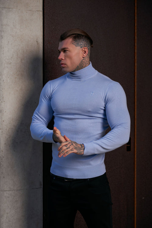 Elevate Your Wardrobe with the Father Sons Pale Blue Roll Neck Knitted Jumper Featuring a Stylish Tonal Emblem - FSN138