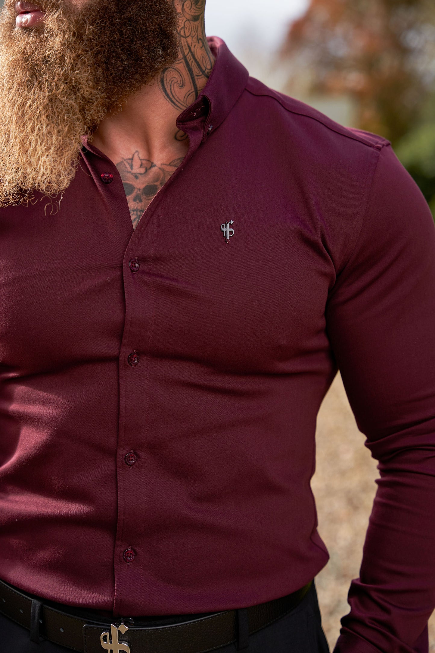 Elevate Your Style with Our Burgundy Super Slim Stretch Denim Long Sleeve Shirt Featuring a Sleek Metal Decal Emblem - FS628