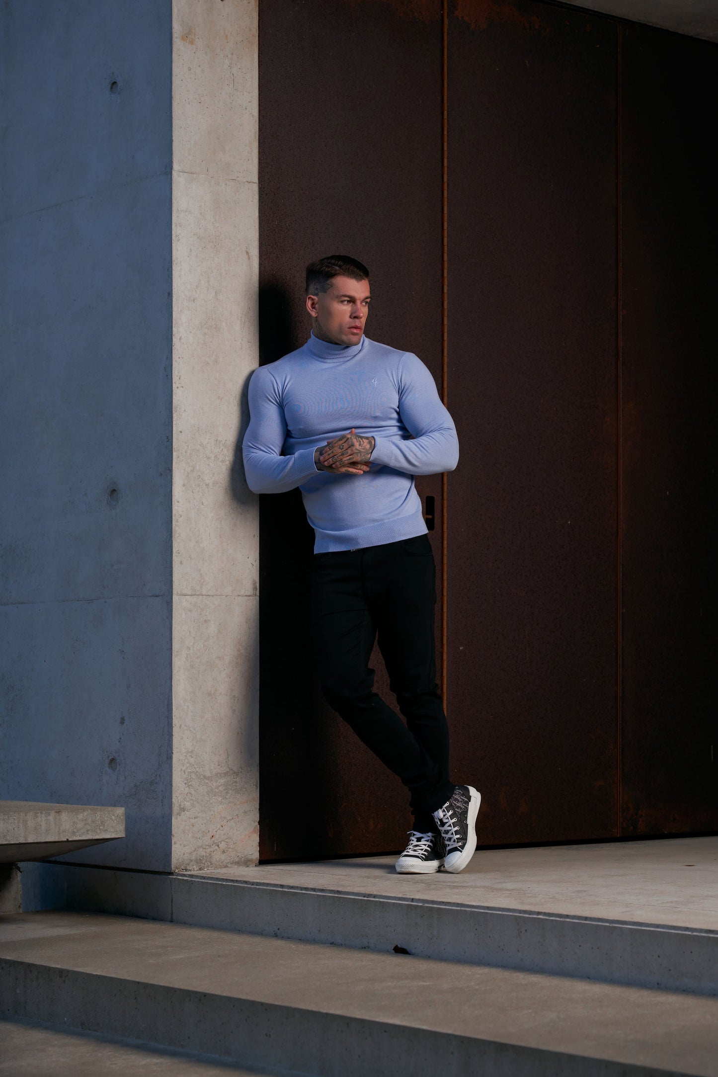 Elevate Your Wardrobe with the Father Sons Pale Blue Roll Neck Knitted Jumper Featuring a Stylish Tonal Emblem - FSN138