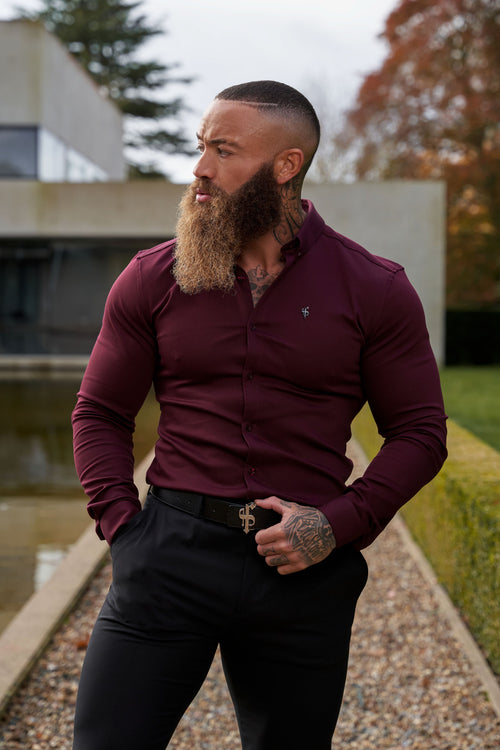 Elevate Your Style with Our Burgundy Super Slim Stretch Denim Long Sleeve Shirt Featuring a Sleek Metal Decal Emblem - FS628