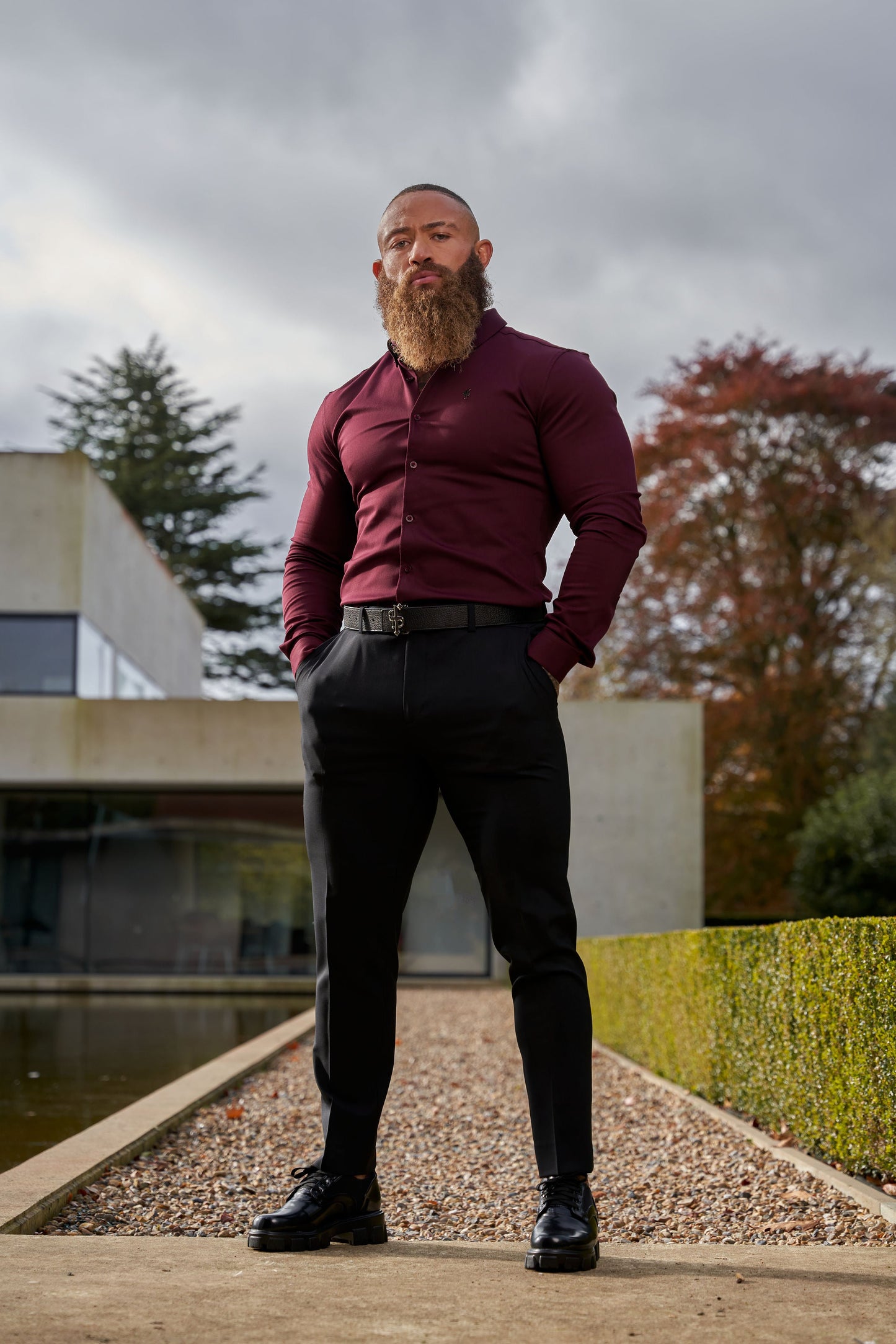 Elevate Your Style with Our Burgundy Super Slim Stretch Denim Long Sleeve Shirt Featuring a Sleek Metal Decal Emblem - FS628