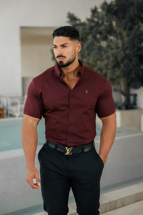 Elevate Your Style with the Father Sons Super Slim Stretch Burgundy Short Sleeve Denim Shirt Featuring a Sleek Metal Decal Emblem - FS629