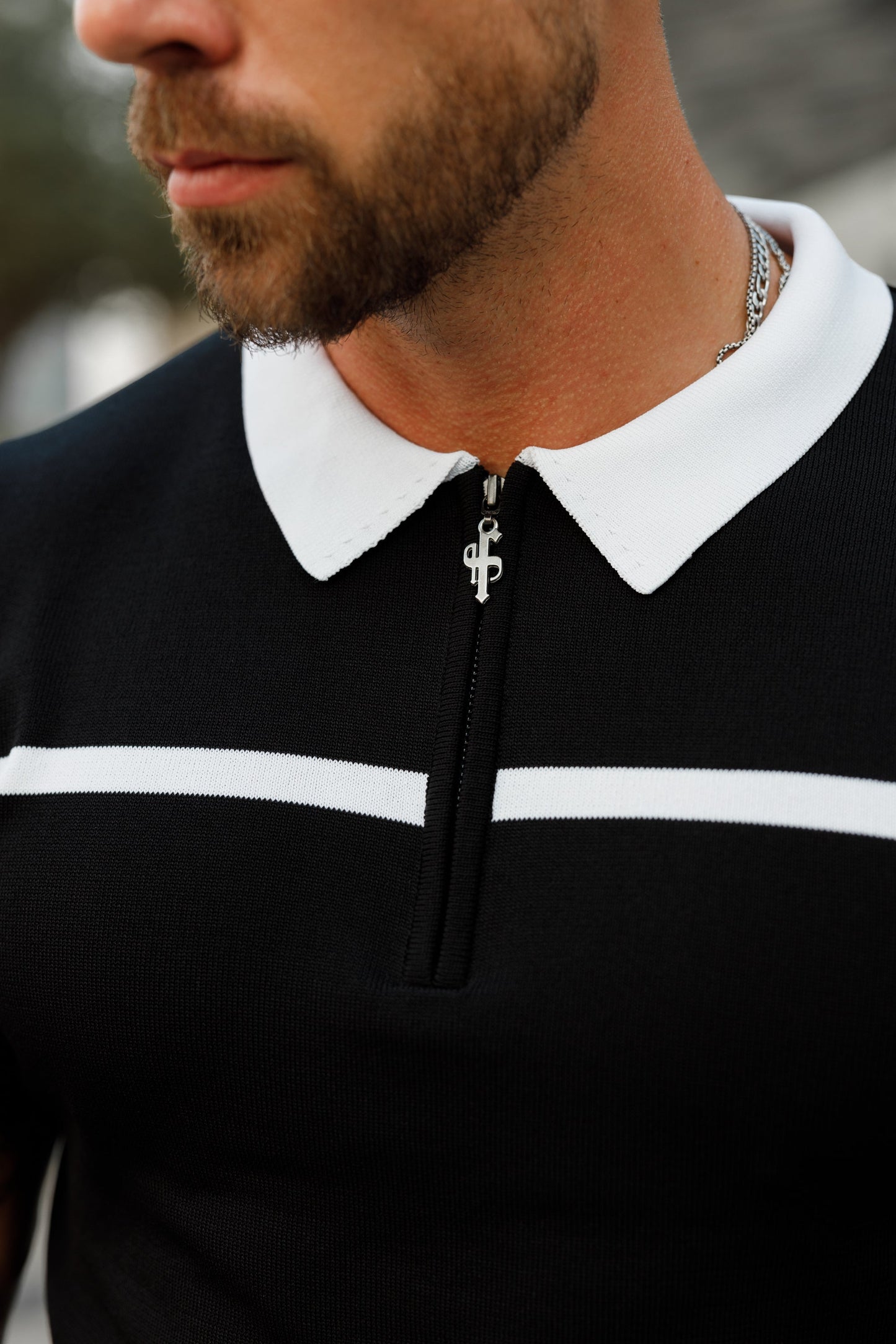 Elevate Your Style with the Father Sons Classic Black & White Striped Zipped Polo - Short Sleeve Edition!