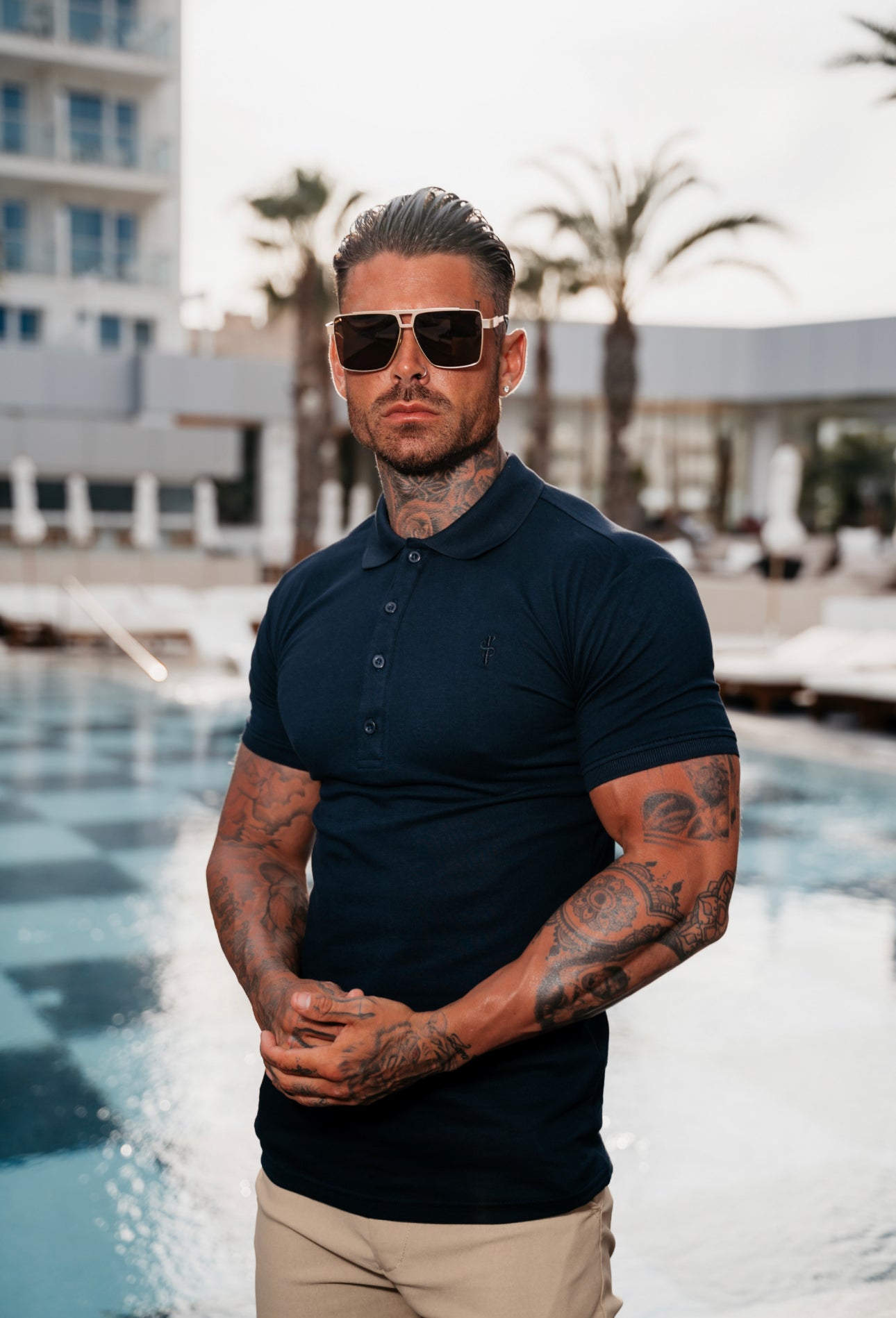 Elevate Your Wardrobe with the Father Sons Timeless Navy Polo Shirt Featuring Tonal Buttons and Elegant Embroidery - FSH825