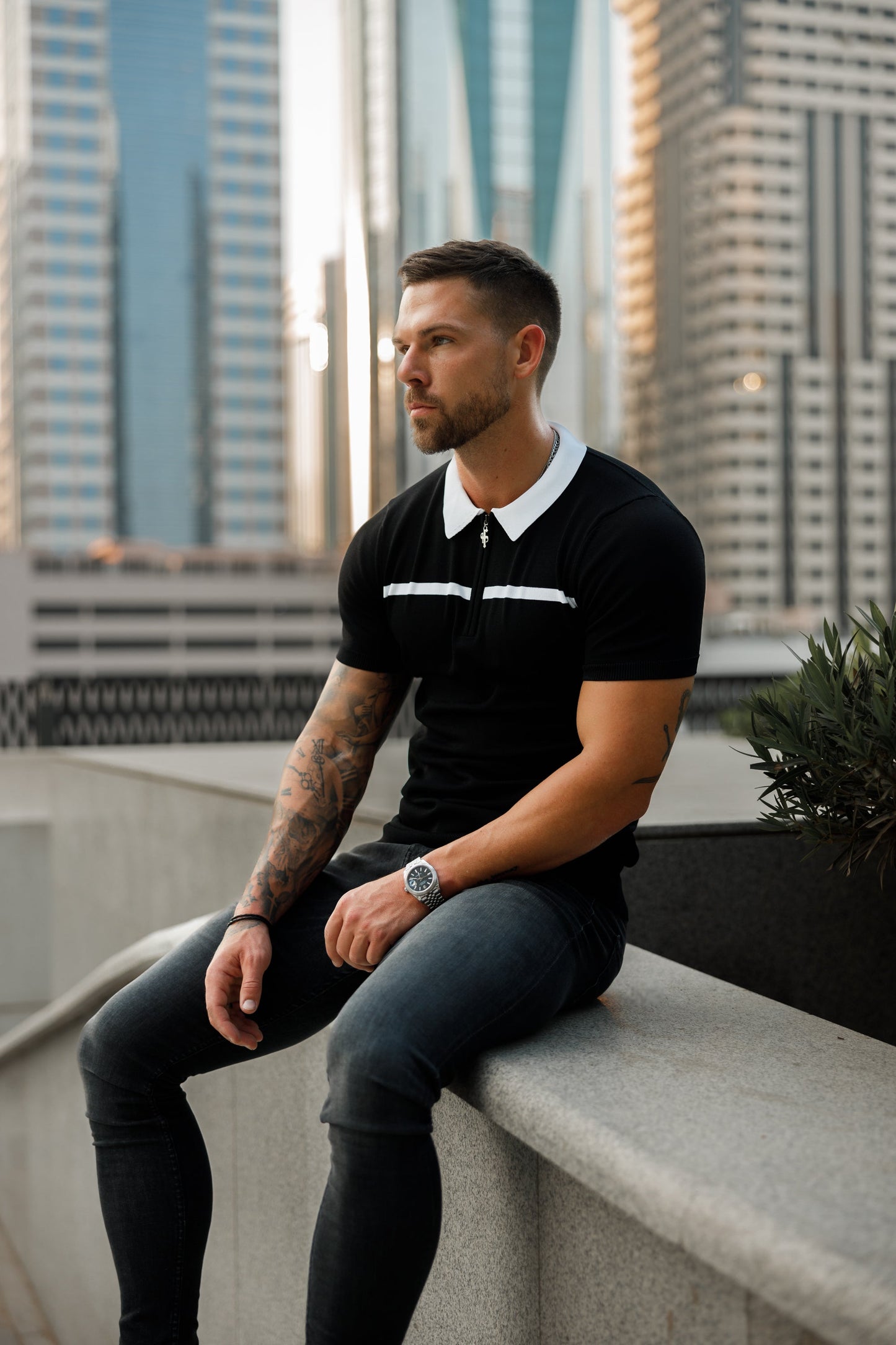 Elevate Your Style with the Father Sons Classic Black & White Striped Zipped Polo - Short Sleeve Edition!