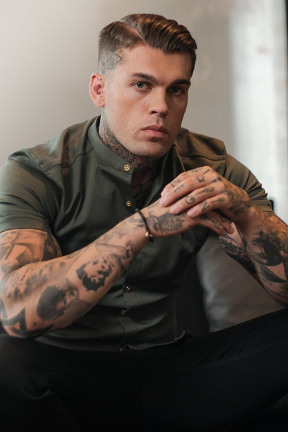 Elevate Your Style with Father Sons Super Slim Stretch Khaki Denim Grandad Shirt – Short Sleeve, Metal Buttons, and Emblem Detail - FS716