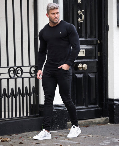 Elevate Your Style with the Father Sons Classic Black Knitted Crew Neck Jumper Featuring a Sleek Metal Decal - FSN086