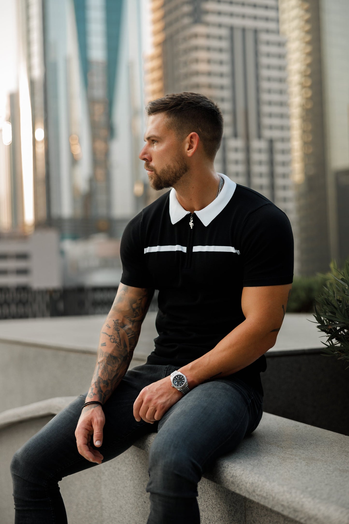 Elevate Your Style with the Father Sons Classic Black & White Striped Zipped Polo - Short Sleeve Edition!